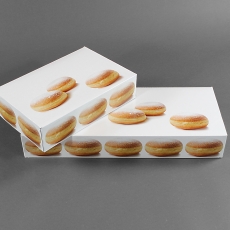 Mehlspeisboxen mit Krapfenmotiv